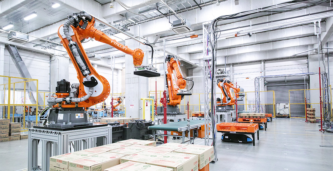 Orange warehouse palletizing robots