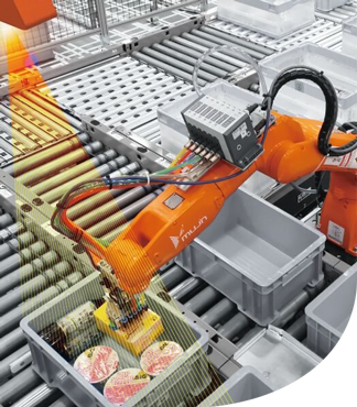 An orange piece picking robot picks up an item in a gray bin on a conveyor belt